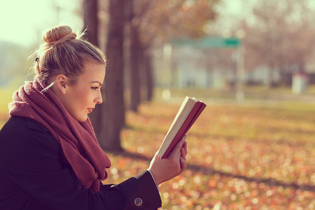 woman wears multifocal contact lenses for reading vision and presbyopia