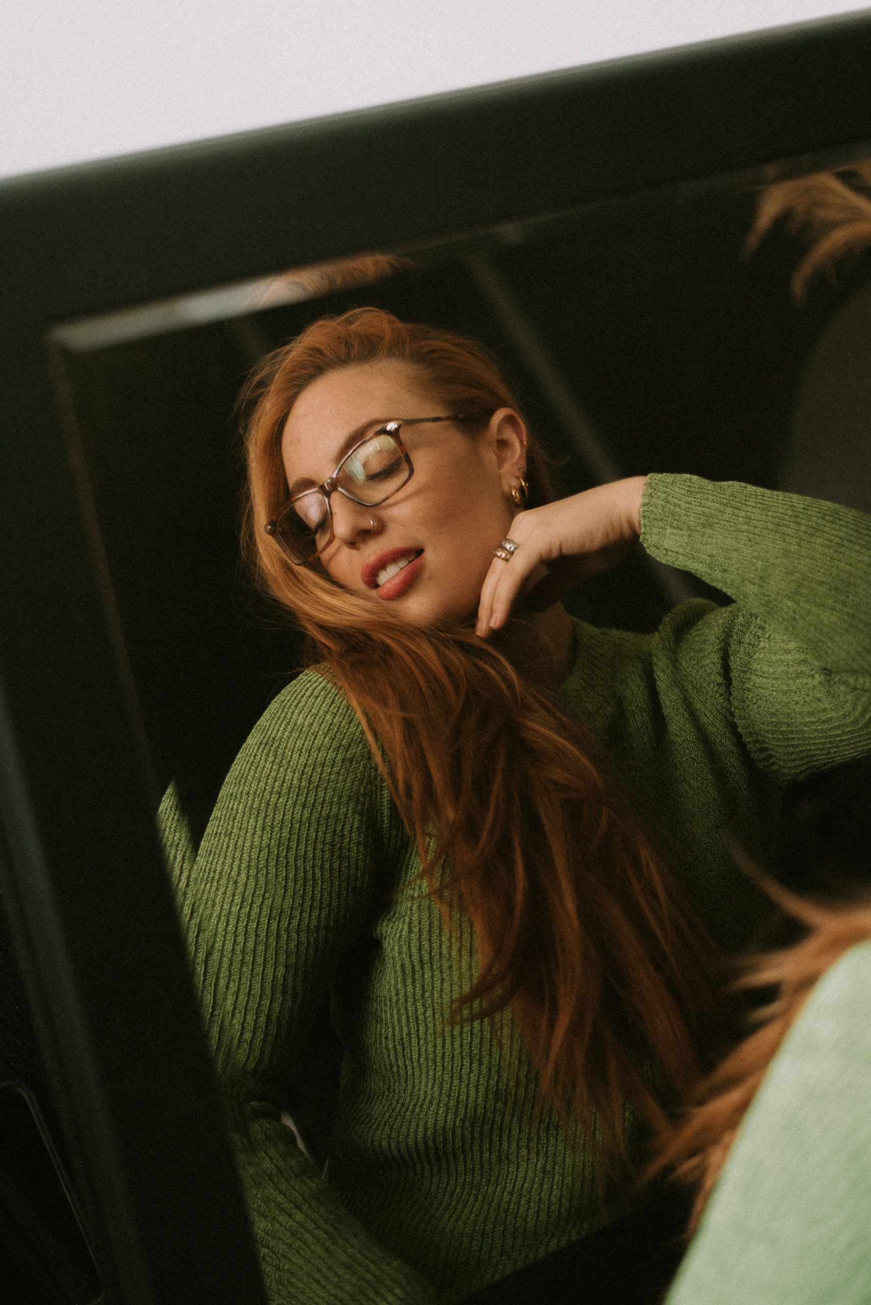 a woman modelling glasses bought online