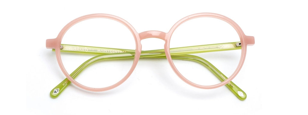 a pair of glasses with pink front and green arms